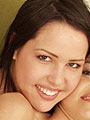 Brunette lesbian teens on the couch licking pussies