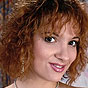 Curly haired cute babe opening hairy