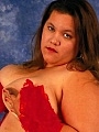 Mature Dark Haired BBW Posing with Her Huge Belly