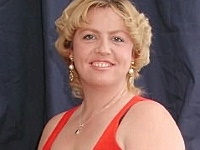 Short Haired Fat Blonde in Red Teasing and Revealing Red Panty