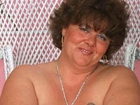 Plumper granny teases with her soft big tits