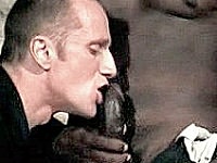 White cop letting black thug inspect his cock with his black lips.