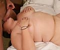 Big titted whore filling her mouth with some hairy balls