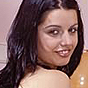 Dark-Haired Teen Gets Naked and Posing in Party