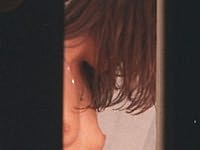 Closet Shot of a Brunette Undressing Her Skirt
