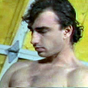 Pretty tanned gay receiving a warm blowjob